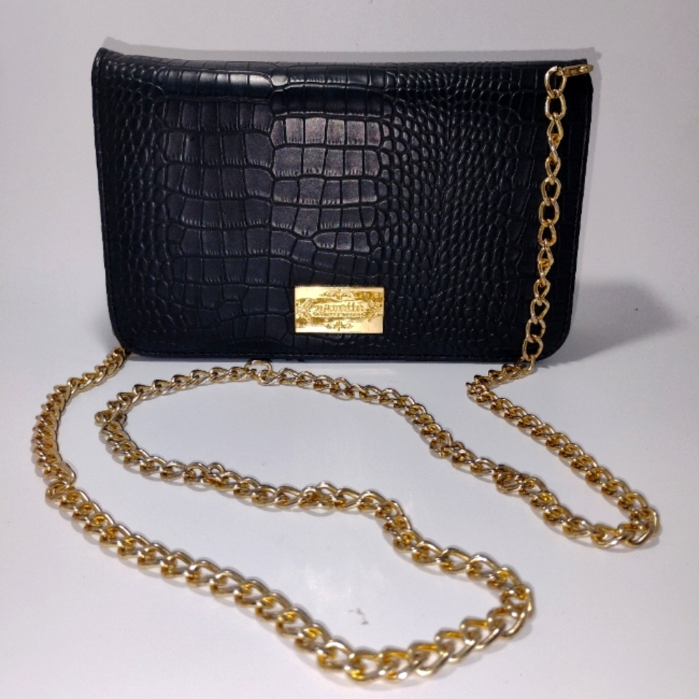 Small Nanette Lapore black snakeskin crossbody bag